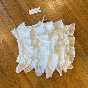 BRAND NEW with tags. ANTHROPOLOGIE tube top with white ruffles.